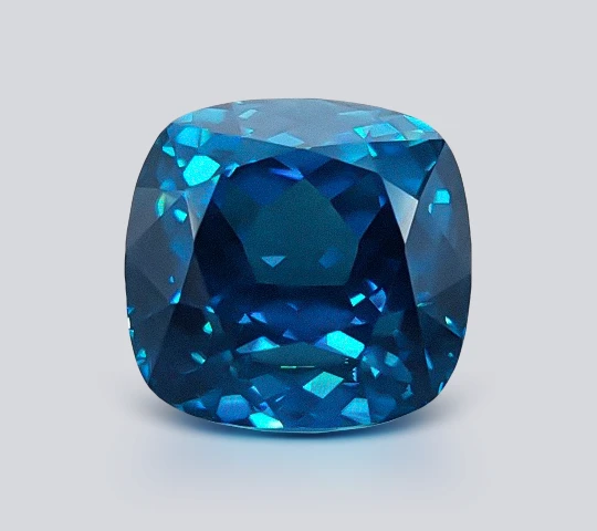 Round cut Blue and light-blue zircon