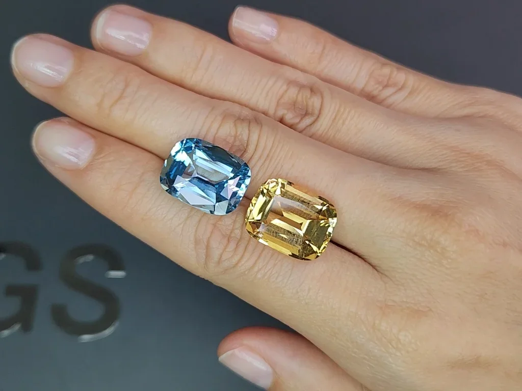 Kontrastierendes paar aus gelbem citrin und himmelblauem topas im präzisionskissenschliff von 24,88 karat  Image №2