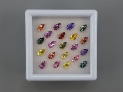 Set of calibrated sapphires 5x3 mm in pear cut 5.09 ct/21 pcs. photo