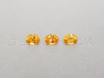 Set of three oval-cut spessartines 4.68 carats photo