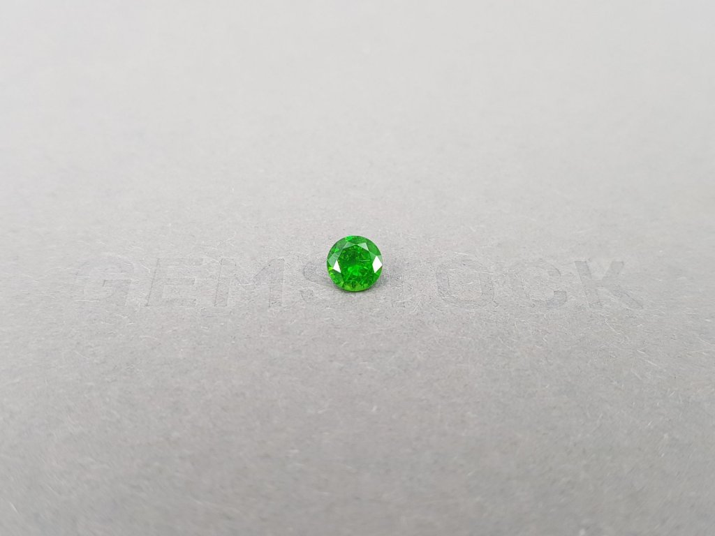 Russian demantoid with horse tail like inclision 0.58 ct Image №1