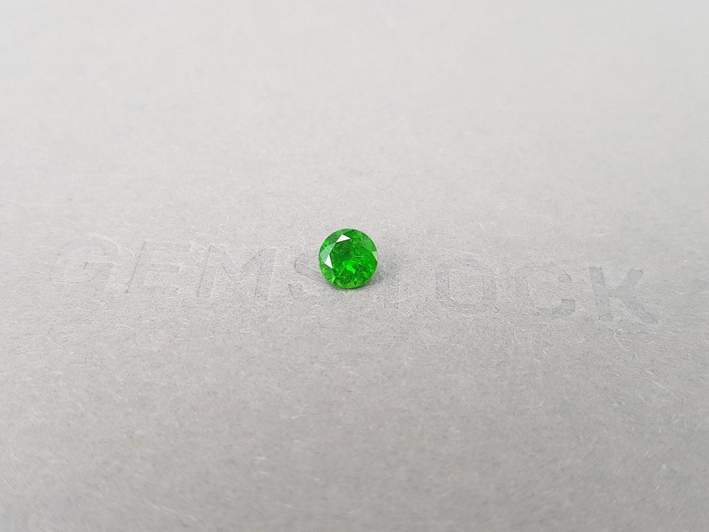 Russian demantoid with horse tail like inclision 0.58 ct Image №3