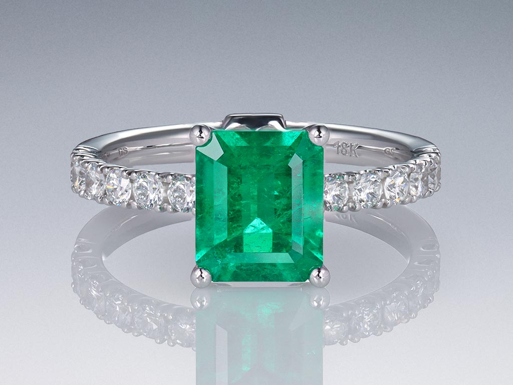 Ring with colombian Muzo Green emerald 1.46 ct and diamonds in 18K white gold Image №1