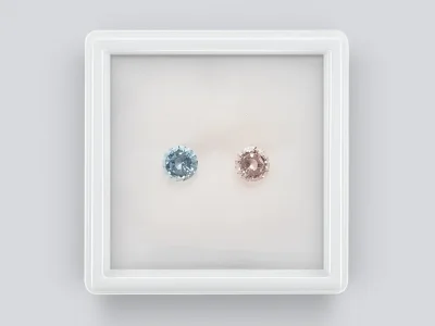 Contrasting pair of aquamarine and morganite in a circle cut of 1.22 carats photo