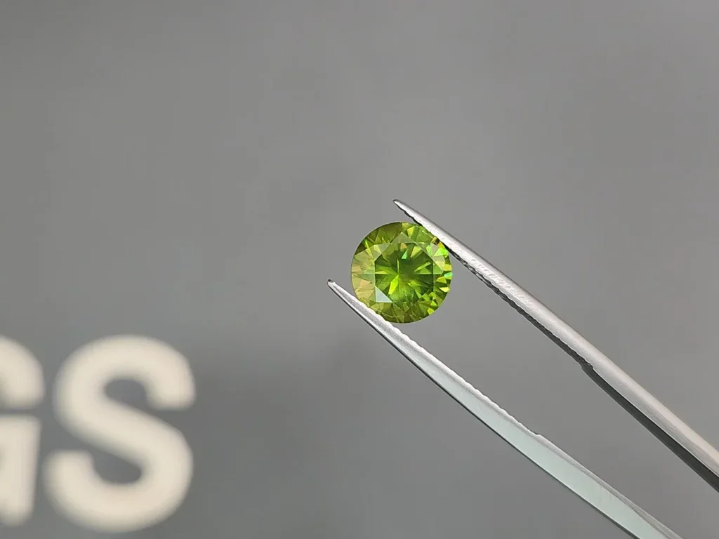 Russian demantoid with horse tail like inclusion 2.59 ct Image №3