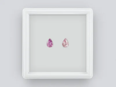 Contrasting pair of untreated pear cut sapphires 1.15 ct photo