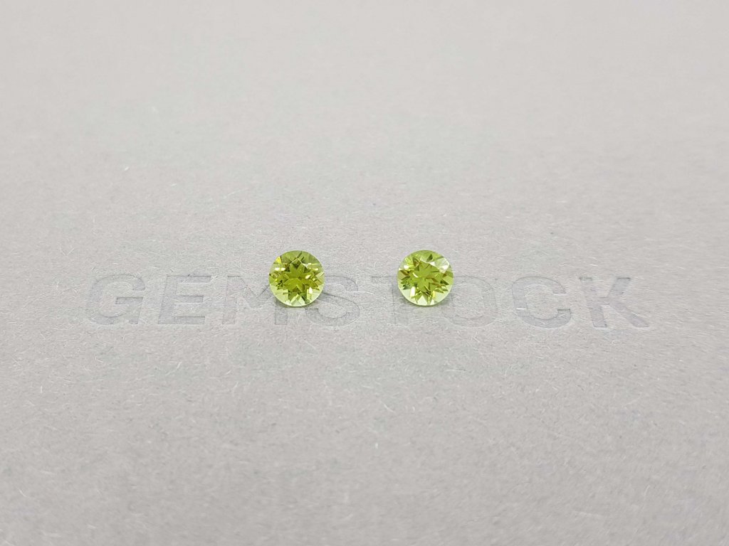 A pair of bright green tourmalines in a 5 mm round cut Image №5