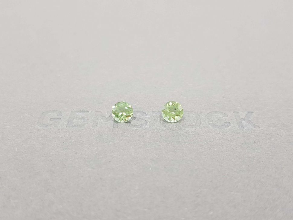A pair of bright green tourmalines in a 5 mm round cut Image №4