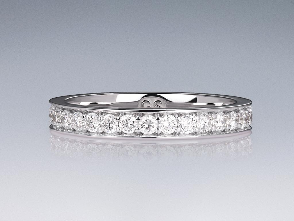 Ring with diamonds in 18K white gold Image №1