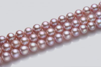 Lot of three strands of freshwater pearls 11-12 mm, China photo