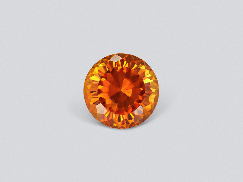 Vivid orange clinohumite 3.88 carats in round cut, Afghanistan Image №1