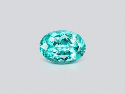 Tourmaline Paraiba bleu verdâtre fluo taille ovale 5,51 carats, Mozambique photo