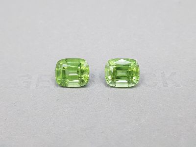 Pair of peridots from Burma in a cushion cut 8.35 ct photo