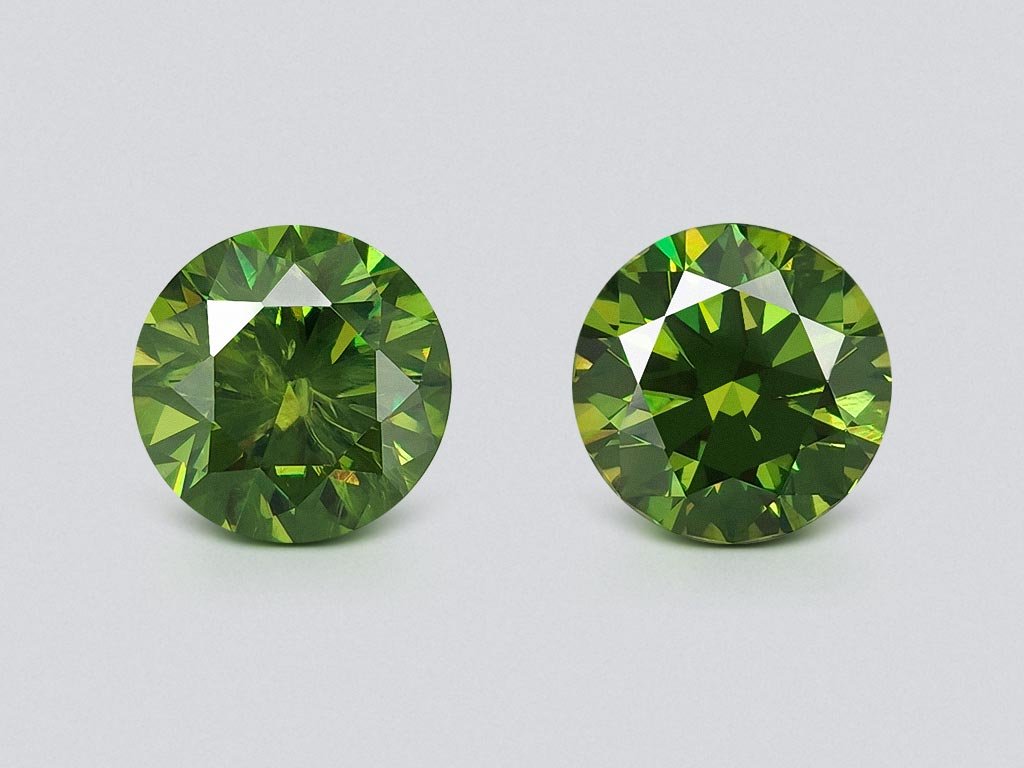 Pair of unique demantoids from Ural mountains in round cut 12.11 carats, GRS Image №1