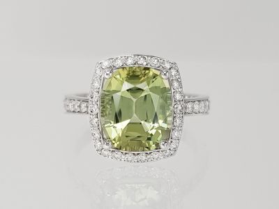 Ring with greenish-yellow tourmaline 3.37 carats and diamonds in 18-carat white gold photo