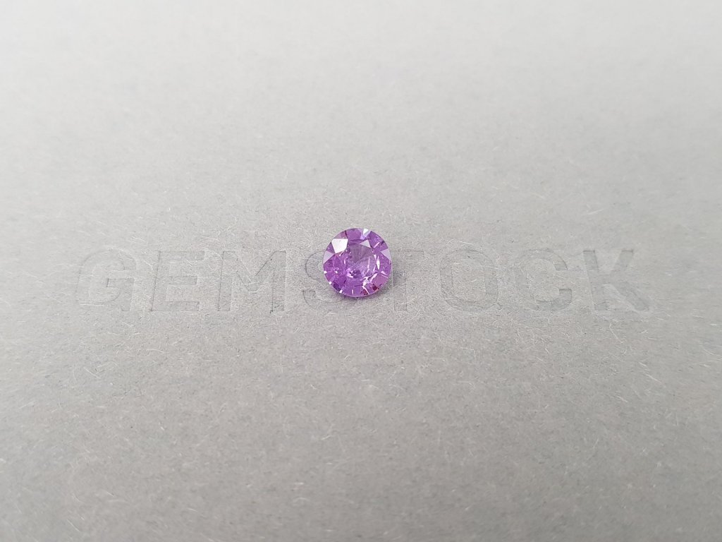 Untreated violet sapphire from Madagascar in round cut 0.91 ct Image №1