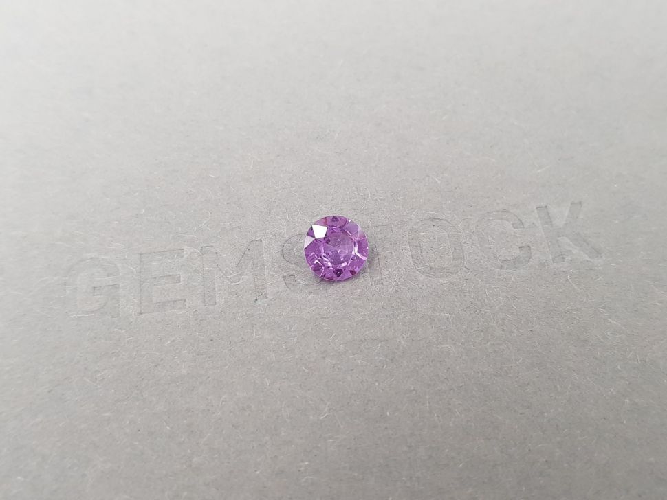 Untreated violet sapphire from Madagascar in round cut 0.91 ct Image №2